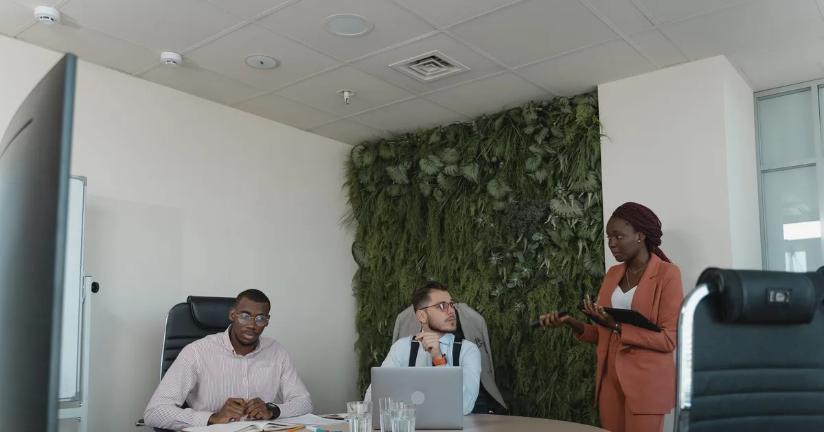 Colleagues meeting at an office table